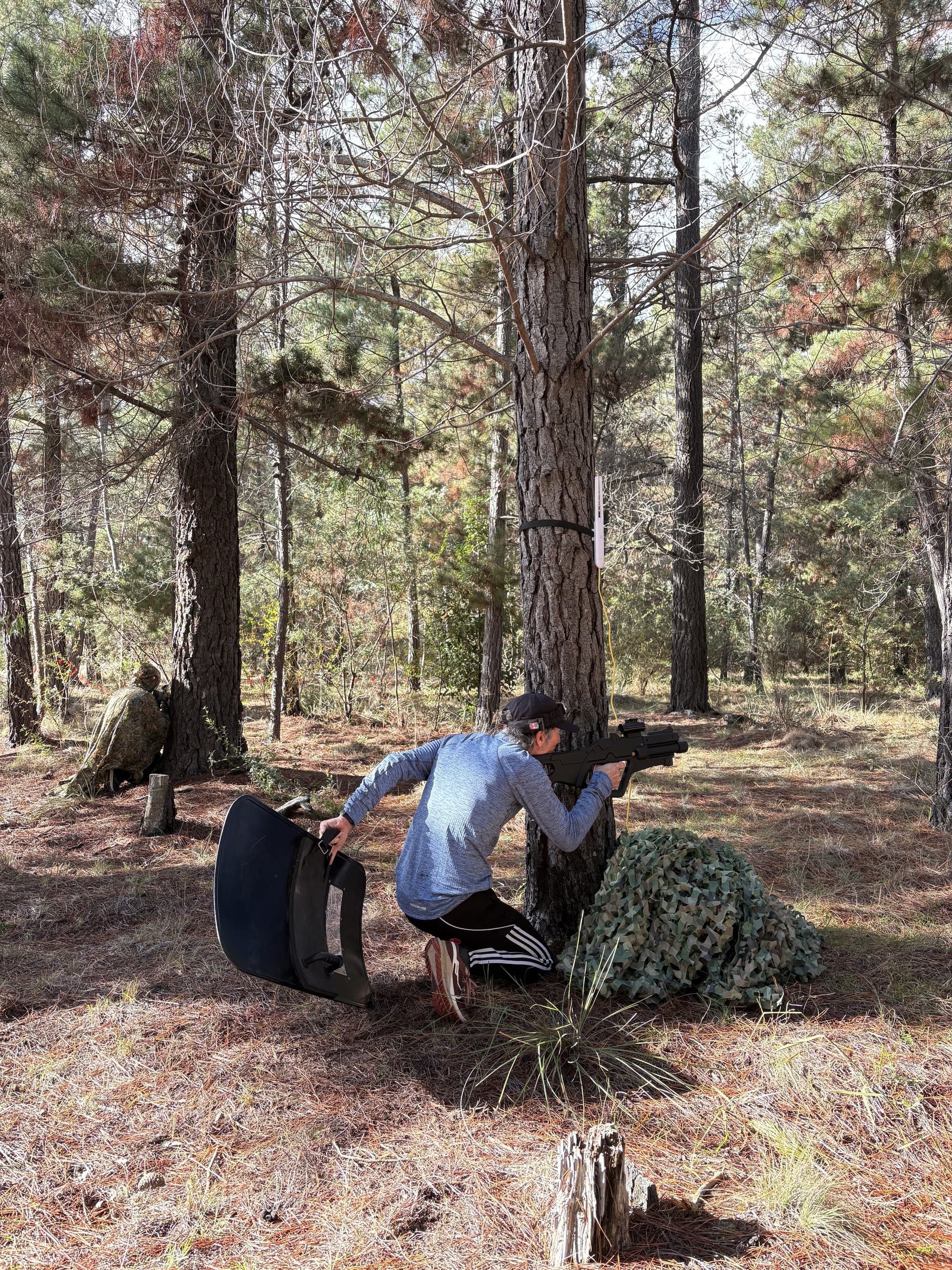 Player aiming from behind cover at Fadden Pines
