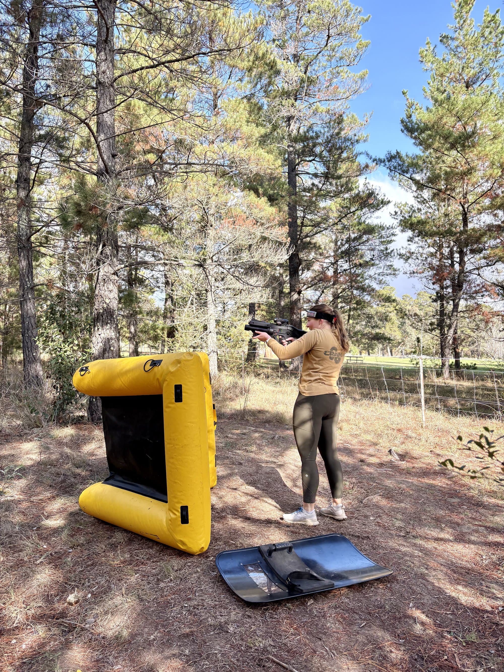 Player aiming gun at inflatable cover