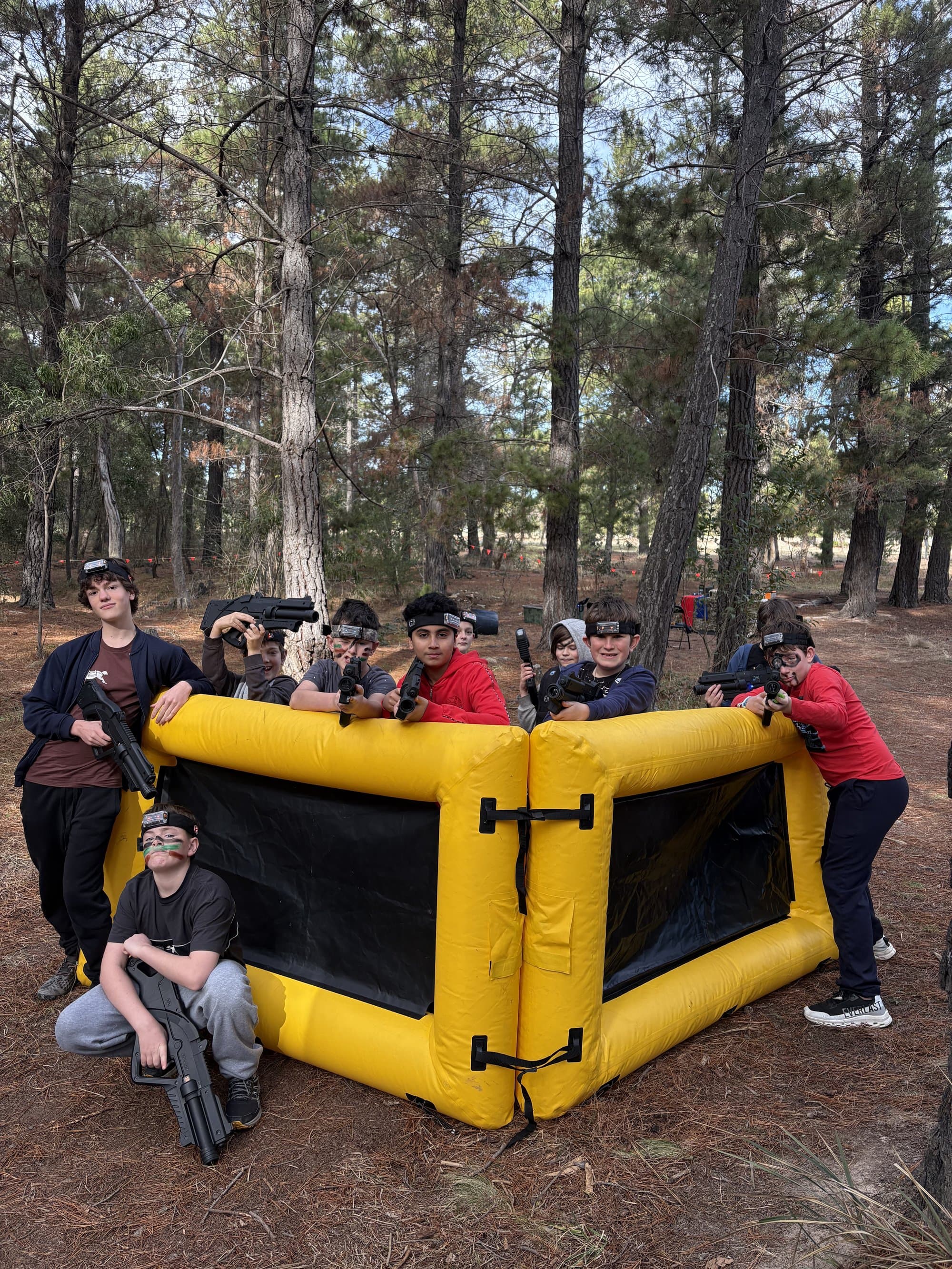 Group of players around an inflatable bunker