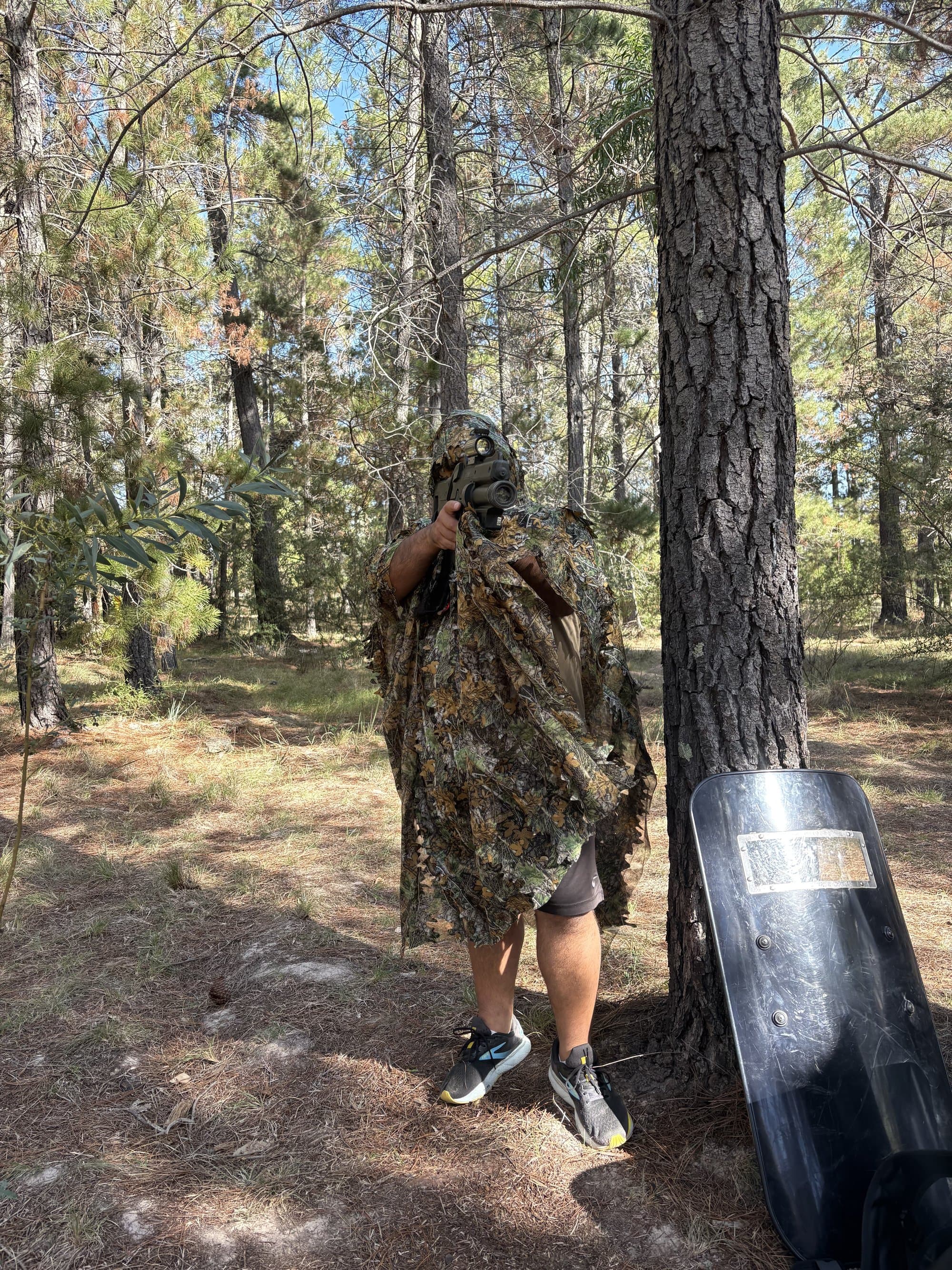 Player in ghillie suit at Fadden Pines